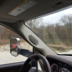 Flat gravel parking and the river at Buzzard Bluff Access